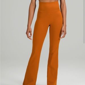 Orange Lululemon Groove Pants